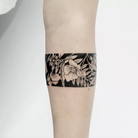 Negative Space Armband Tattoo