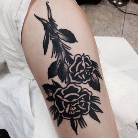 Negative Space Rose Tattoo