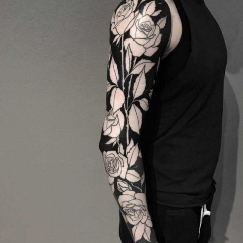 Negative Space Sleeve Tattoo